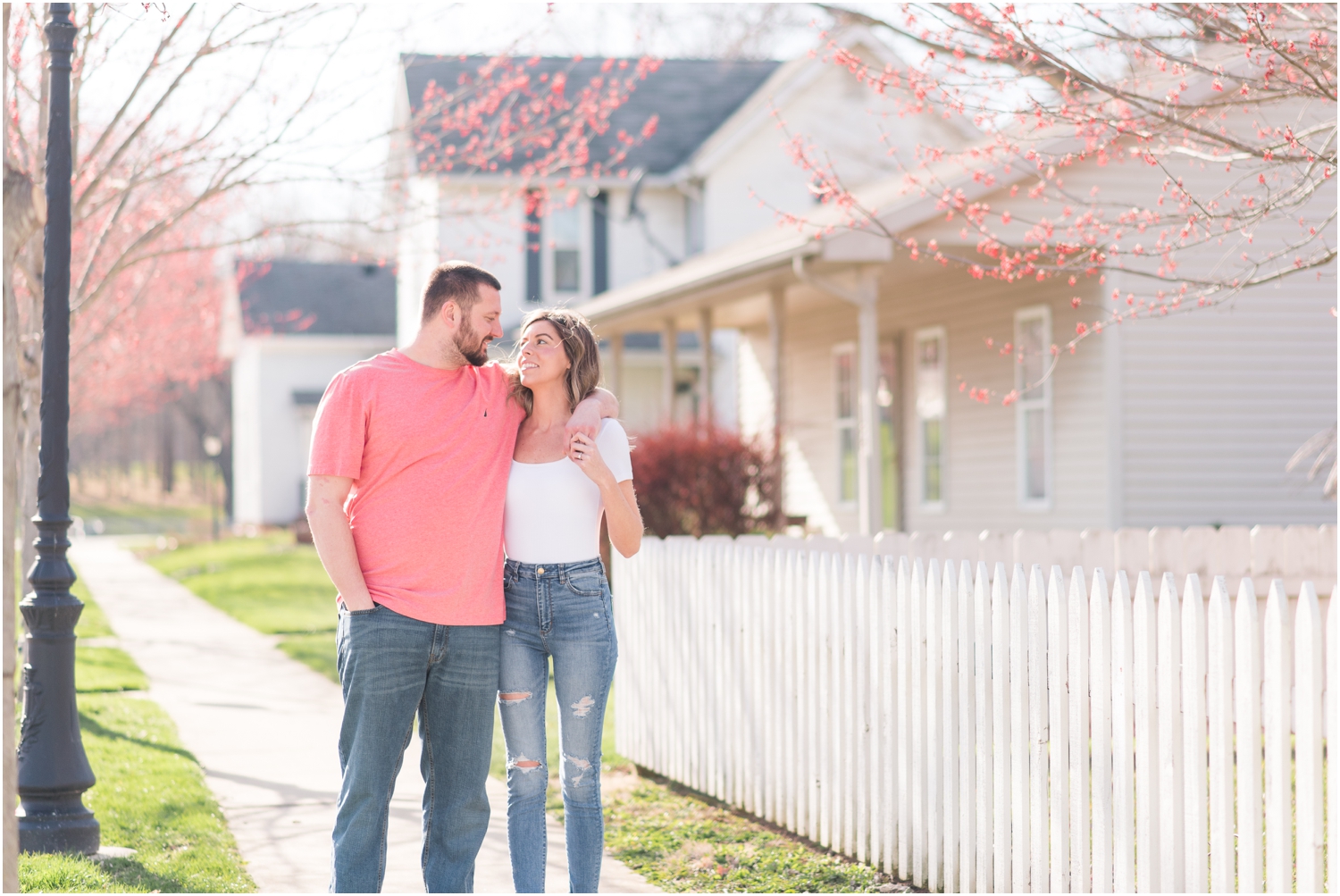 Fort Wayne Indiana wedding photographer engagement session spring blooming trees Rose Courts Photography