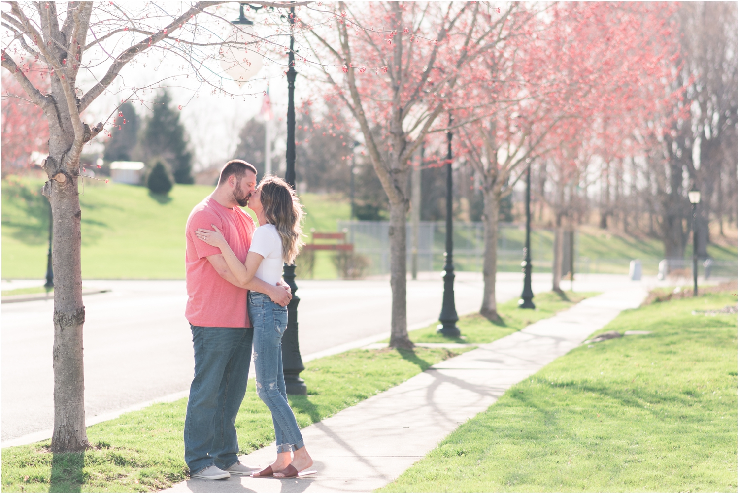 Fort Wayne Indiana wedding photographer engagement session spring blooming trees Rose Courts Photography