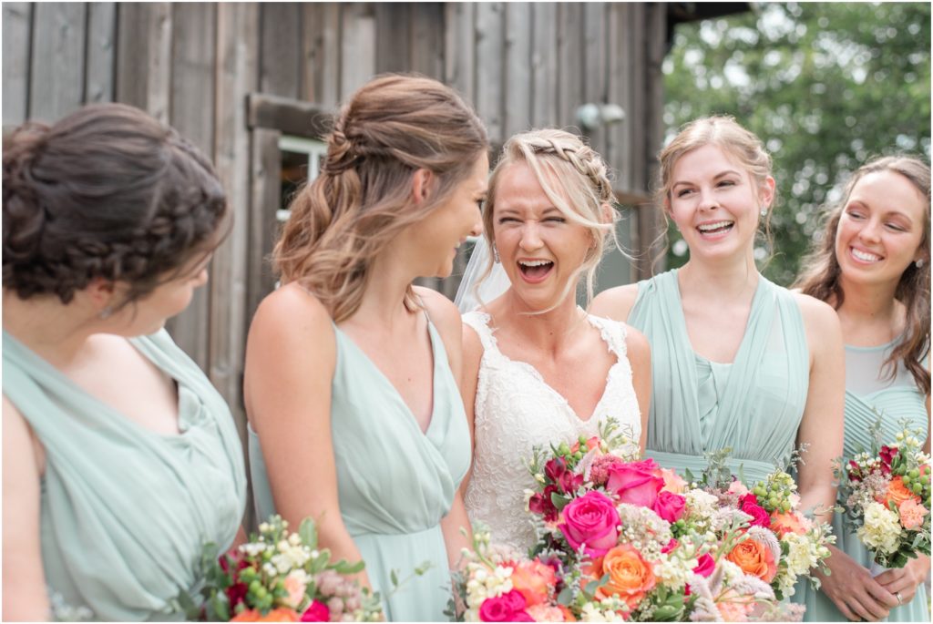 Bridesmaids photos The Barn at Kennedy Farm Wedding with bright, colorful bouquets and sage green bridesmaids Indiana Wedding Photographer Rose Courts Photography