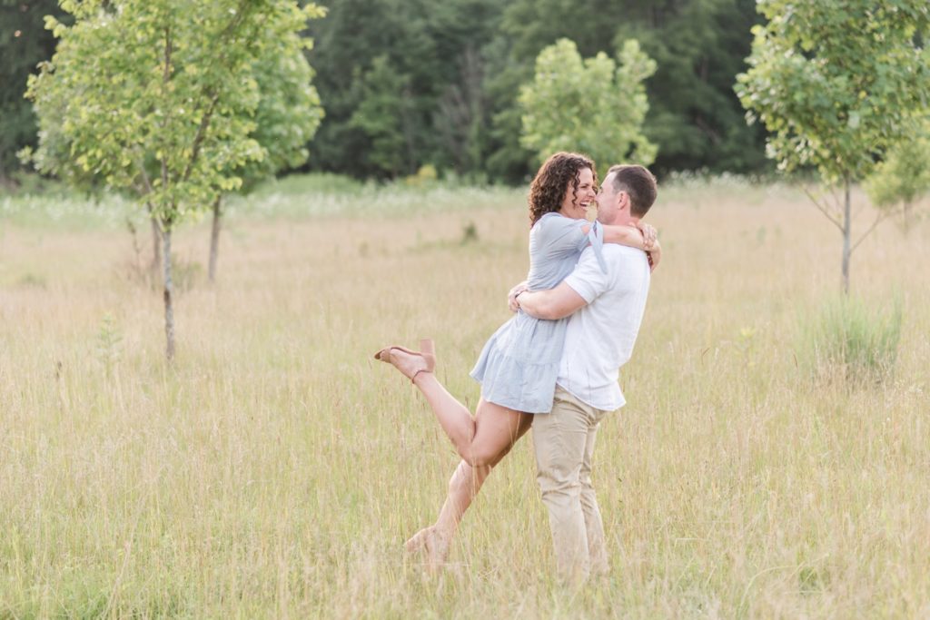 photo of engaged couple at Sunset Engagement Session at Metea Park by Courtney Rudicel, a wedding photographer in Indiana