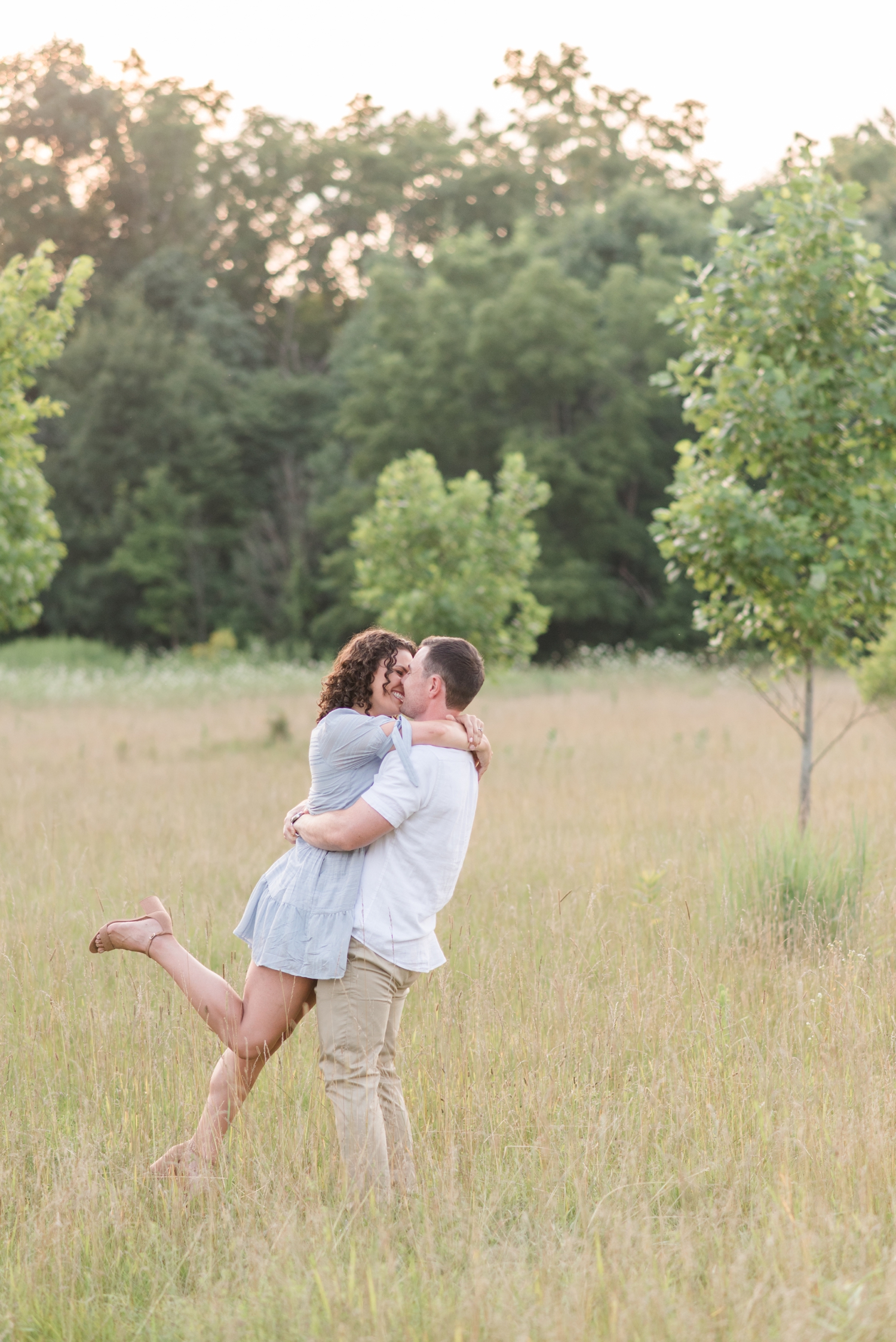 photo of engaged couple at Sunset Engagement Session at Metea Park by Courtney Rudicel, a wedding photographer in Indiana
