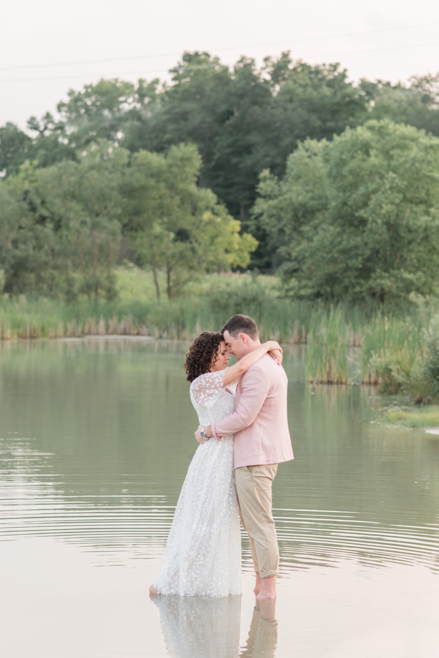 photo of couple in water at Metea Park Engagement Session by Courtney Rudicel, a wedding photographer in Indiana