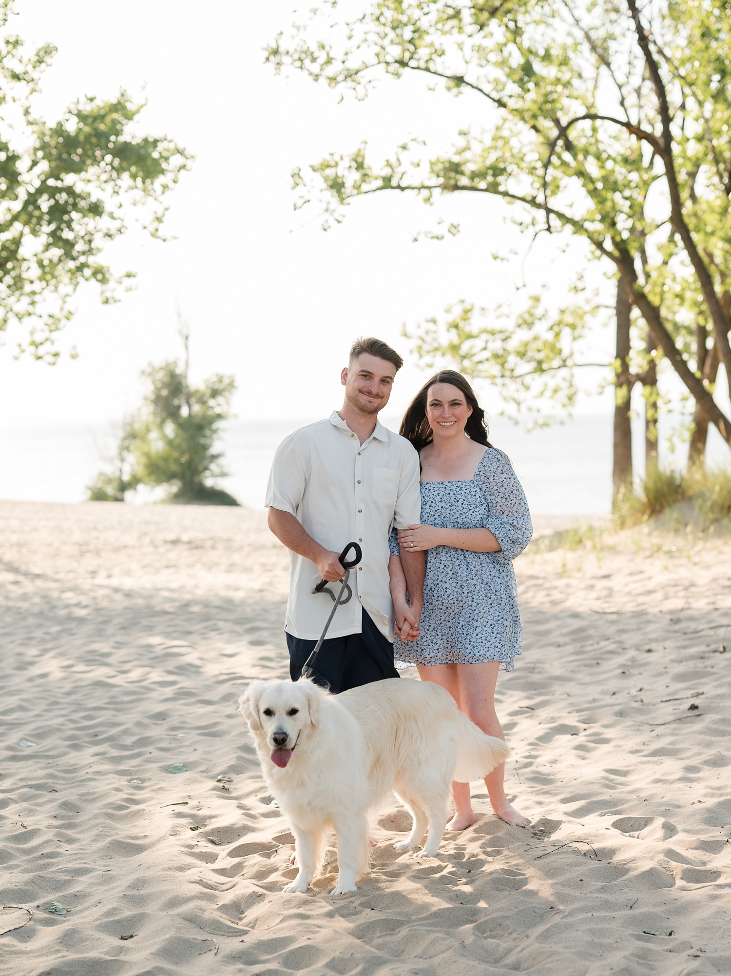 Indiana Dunes Engagement Photos by South Bend Wedding Photographer Courtney Rudicel with golden retriever