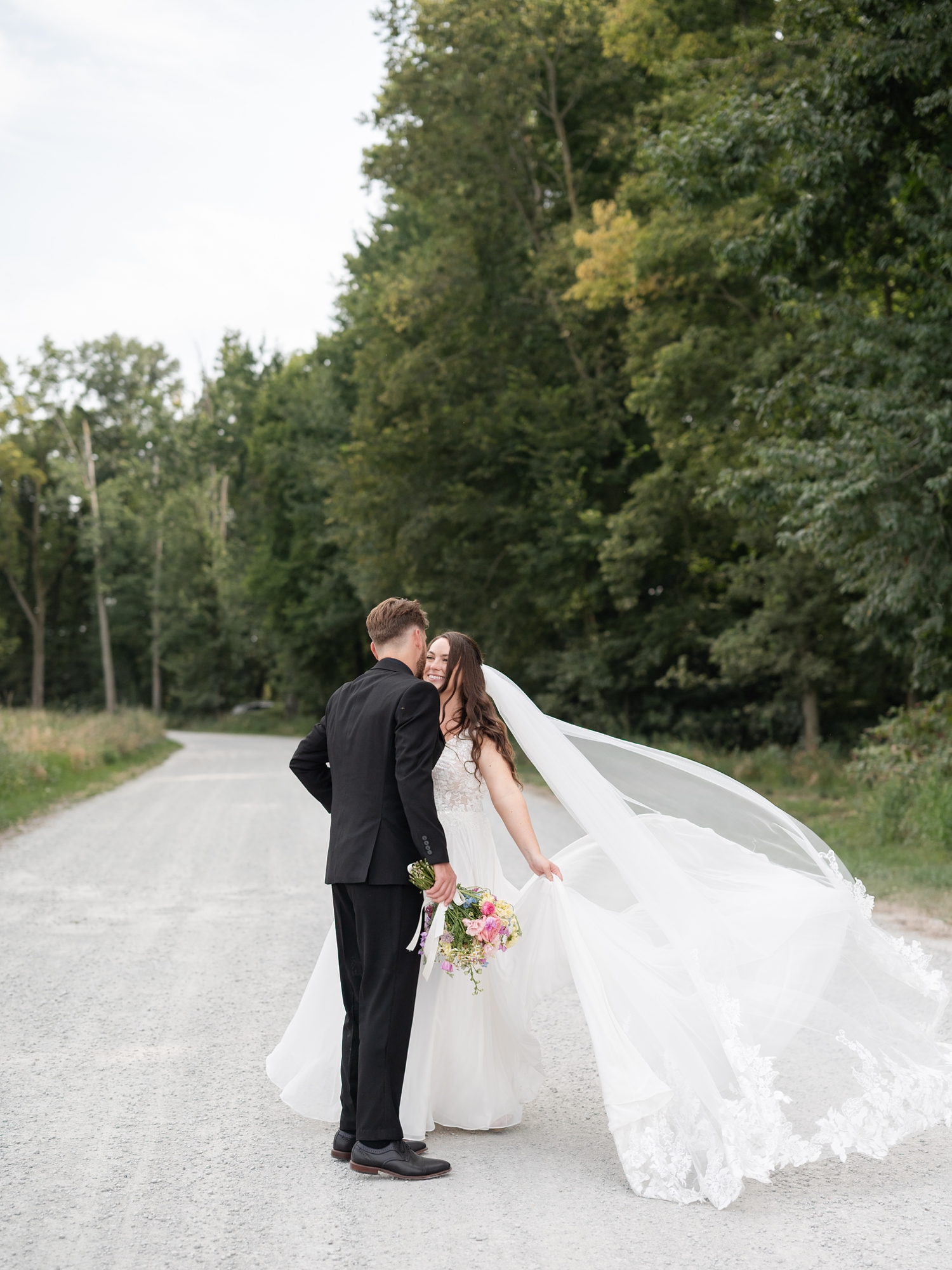 Colorful Wildflower Wedding at The Wooded Knot by South Bend Wedding Photographer Courtney Rudicel