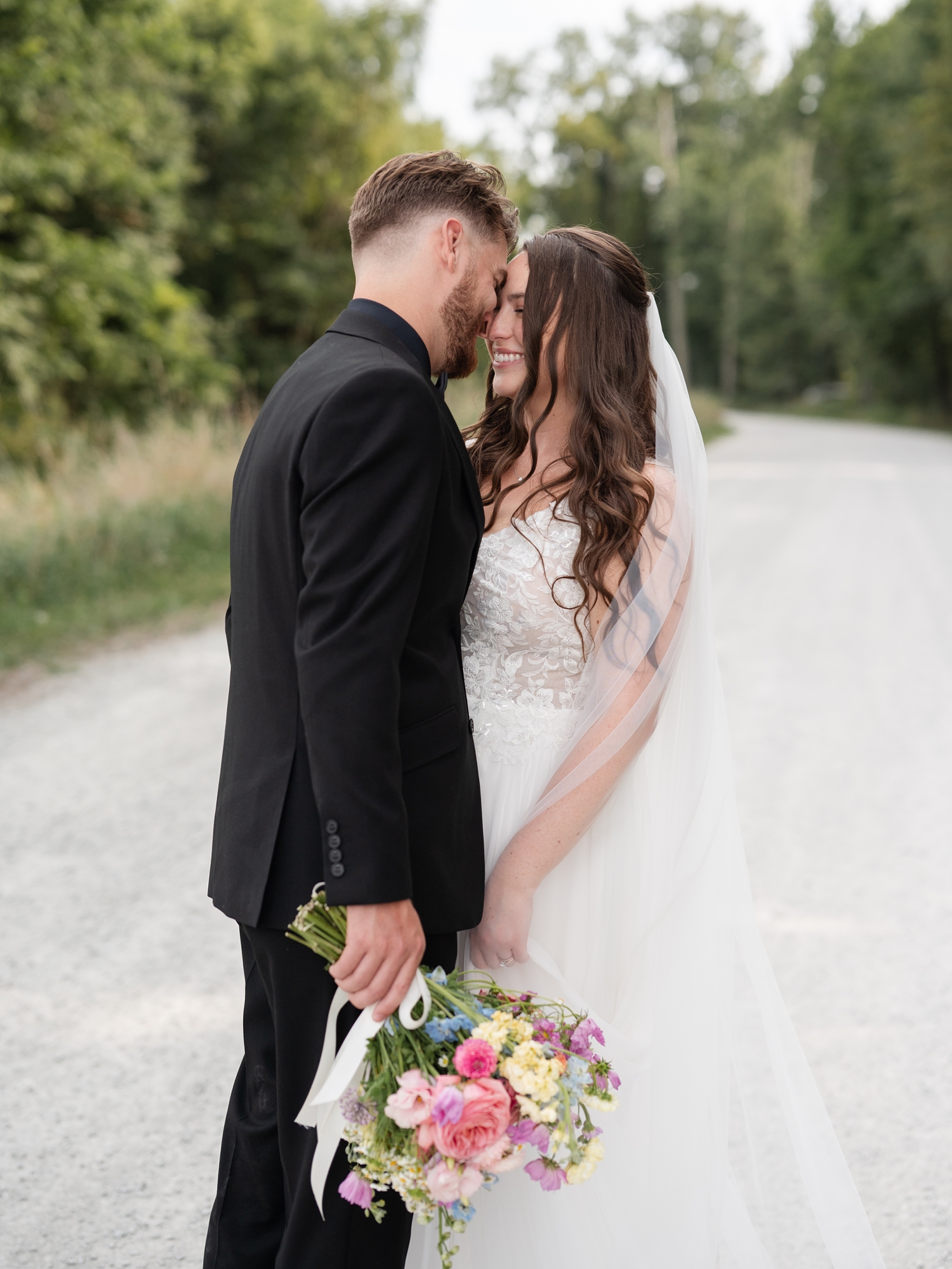 Colorful Wildflower Wedding at The Wooded Knot by South Bend Wedding Photographer Courtney Rudicel