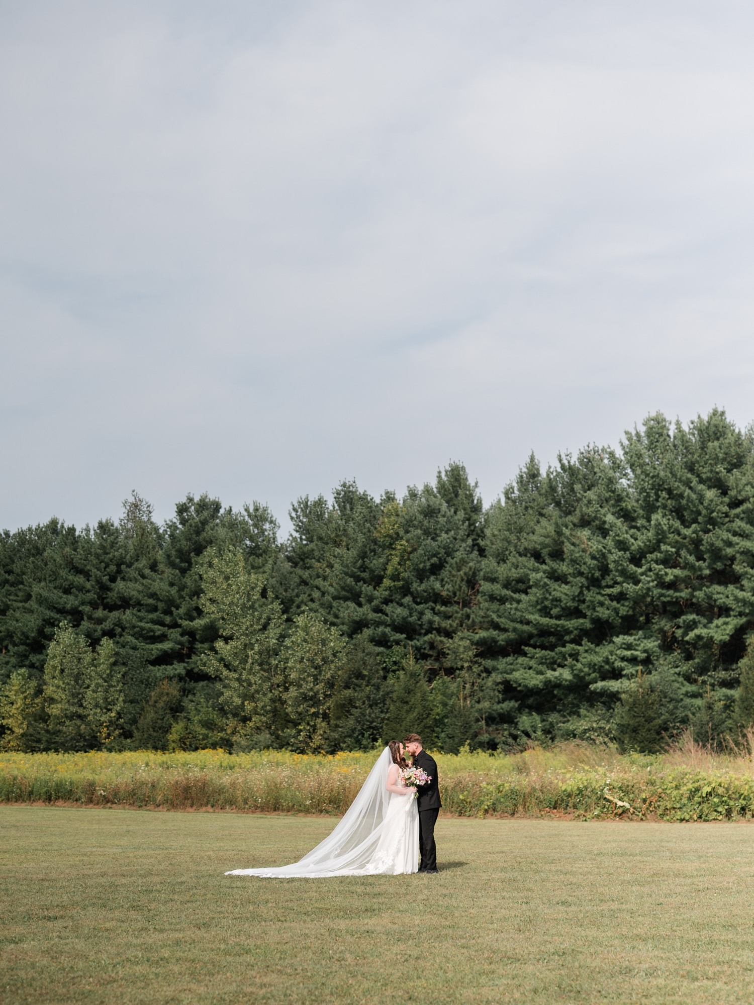 Colorful Wildflower Wedding at The Wooded Knot by South Bend Wedding Photographer Courtney Rudicel