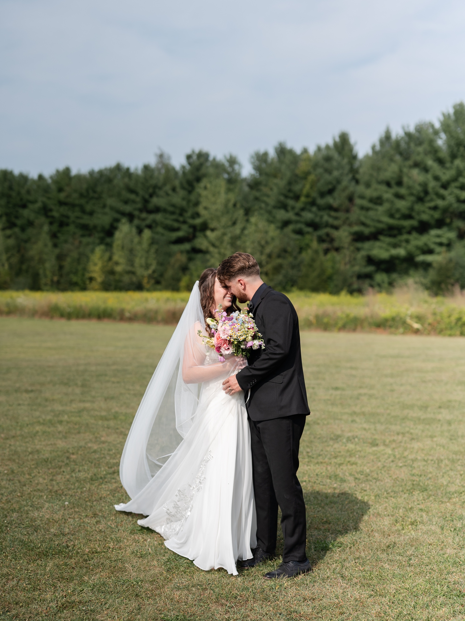 Colorful Wildflower Wedding at The Wooded Knot by South Bend Wedding Photographer Courtney Rudicel