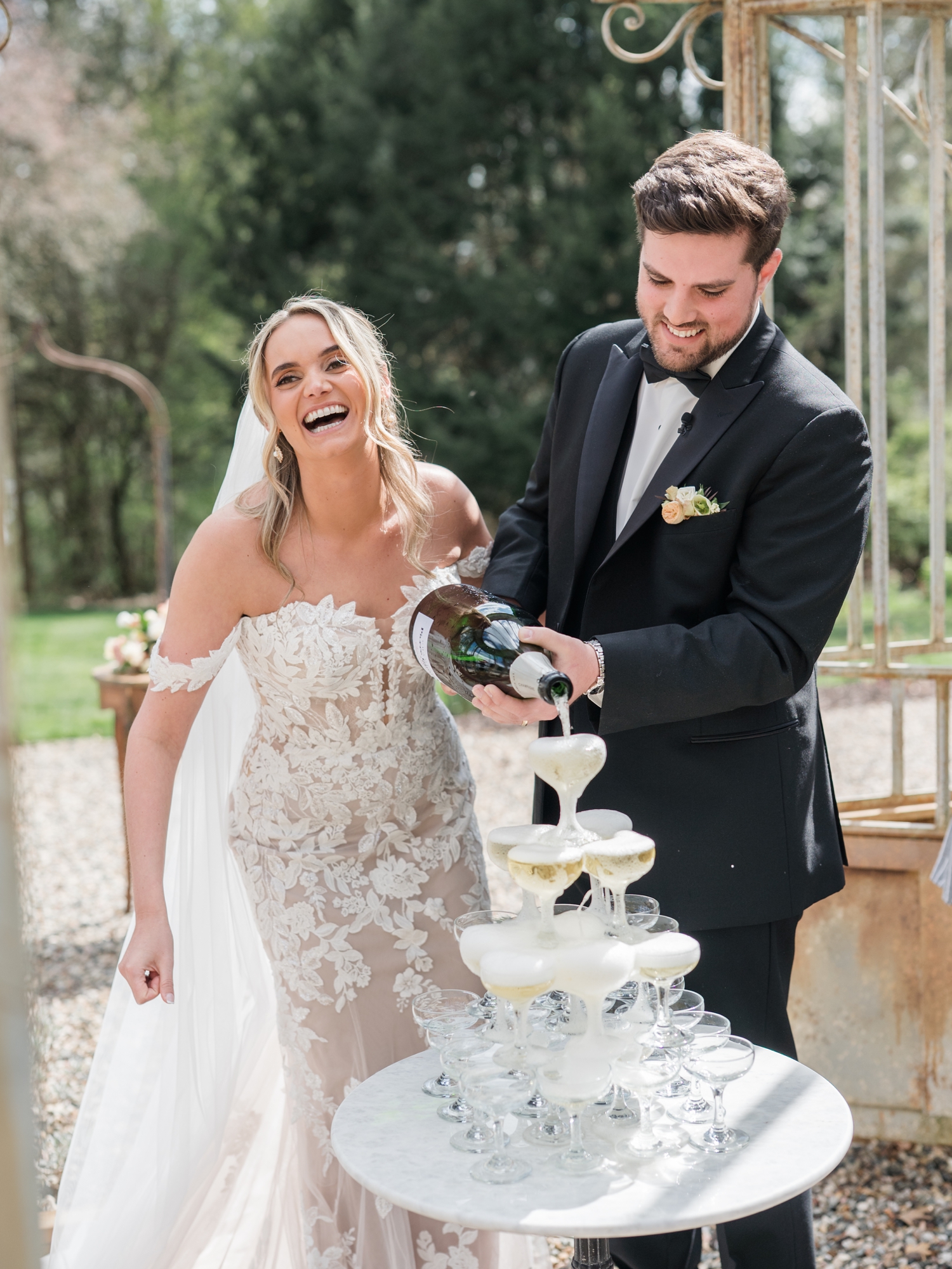 Greencrest Manor mansion cocktail hour in gardens by Michigan Wedding Photographer Courtney Rudicel