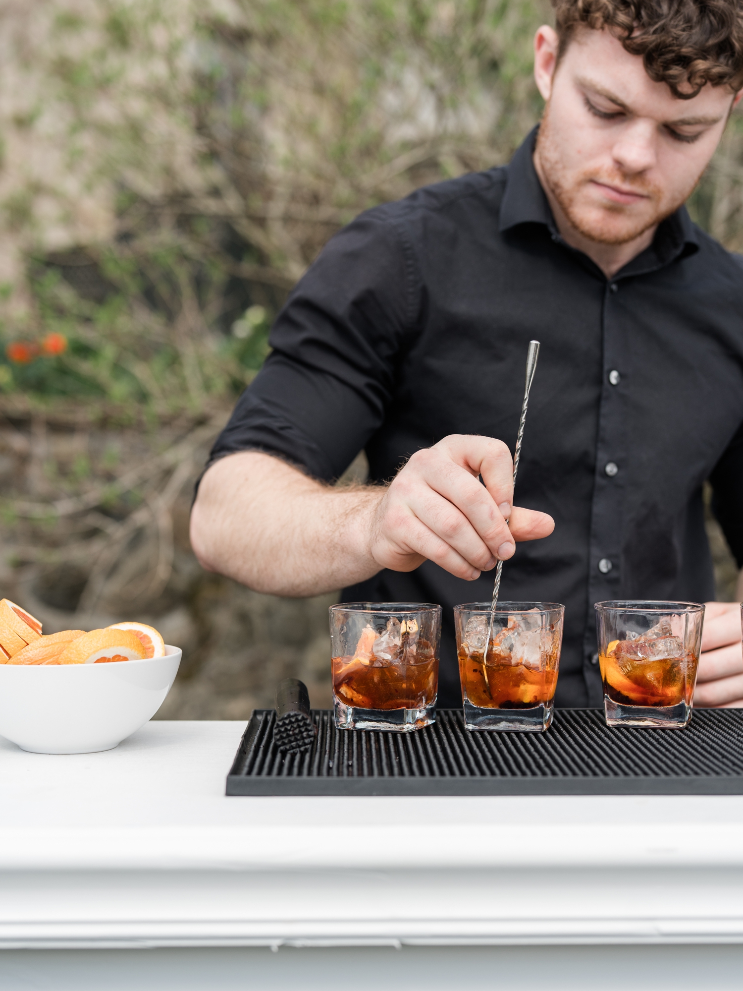 Greencrest Manor mansion cocktail hour in gardens by Michigan Wedding Photographer Courtney Rudicel