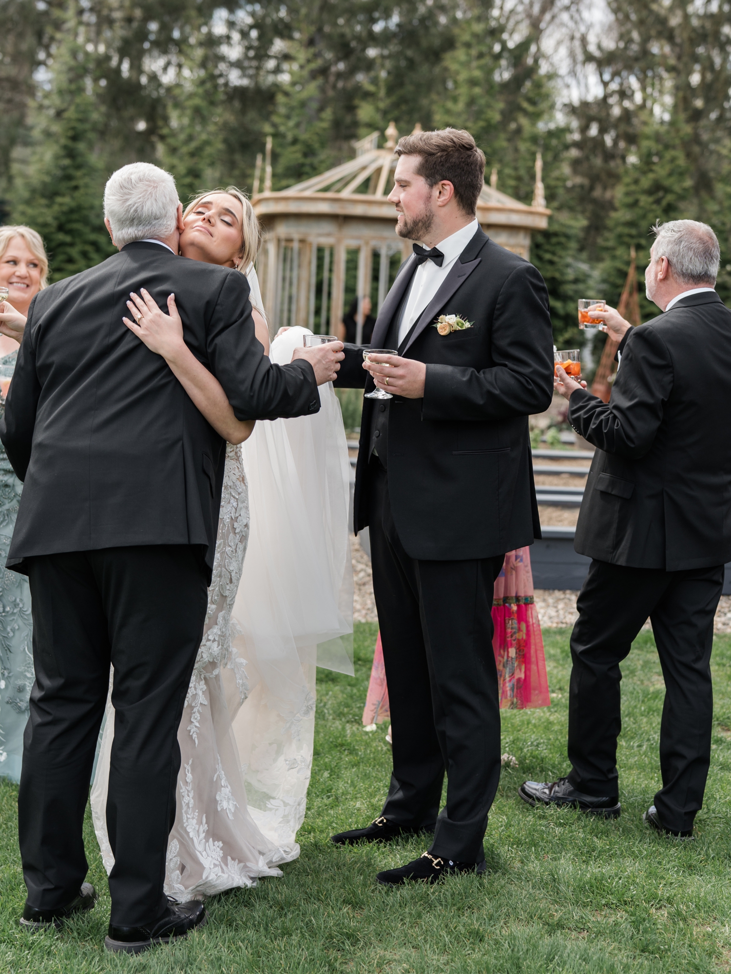 Greencrest Manor mansion cocktail hour in gardens by Michigan Wedding Photographer Courtney Rudicel