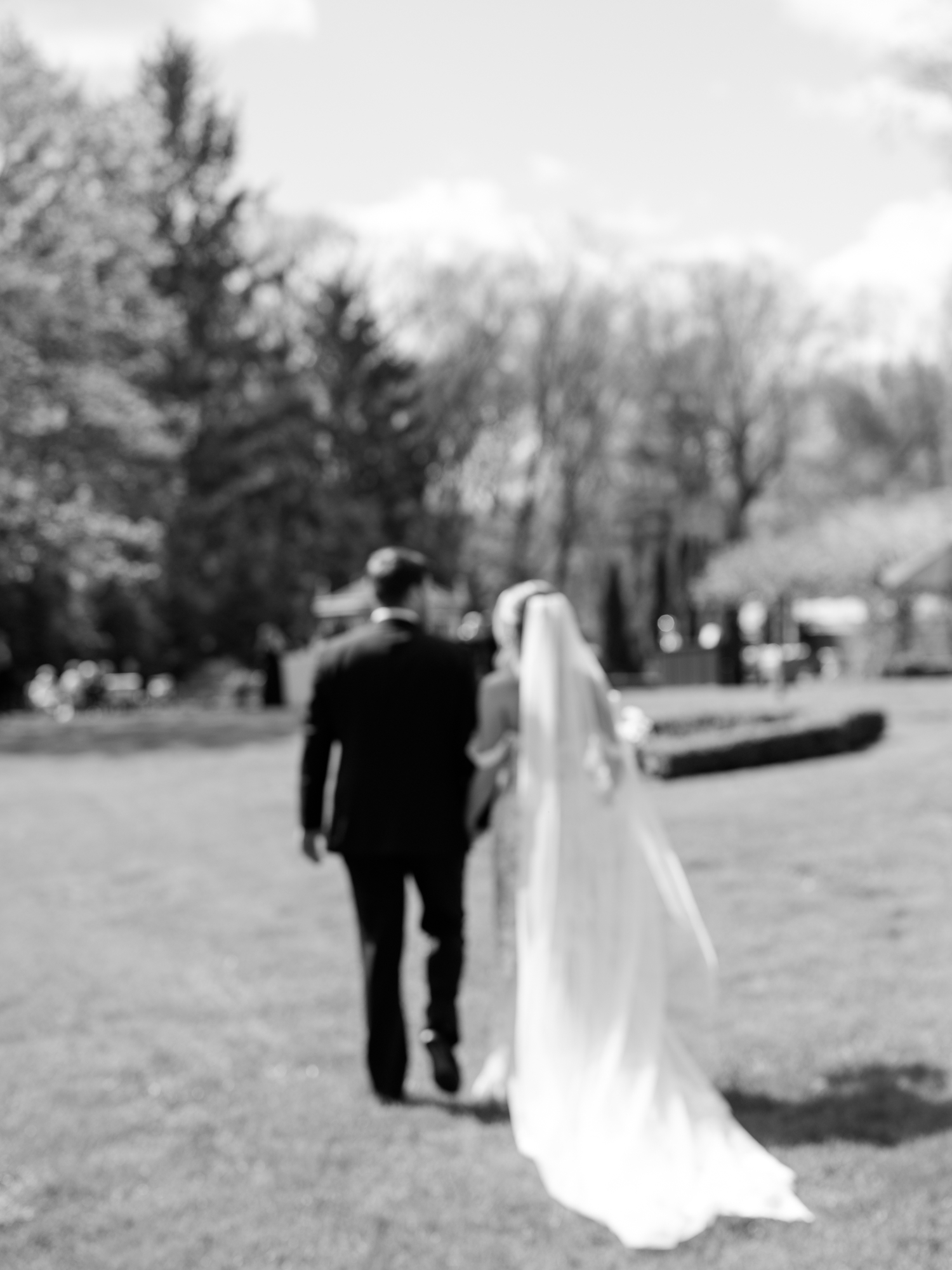 Greencrest Manor mansion cocktail hour in gardens by Michigan Wedding Photographer Courtney Rudicel