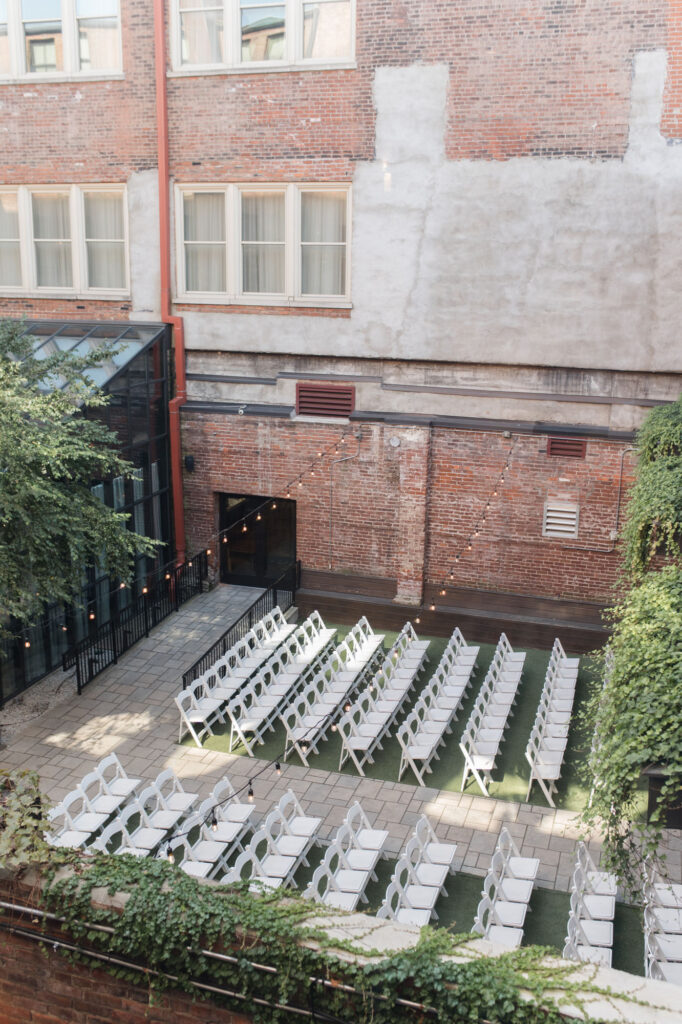 covington hotel wedding​ ceremony in the courtyard