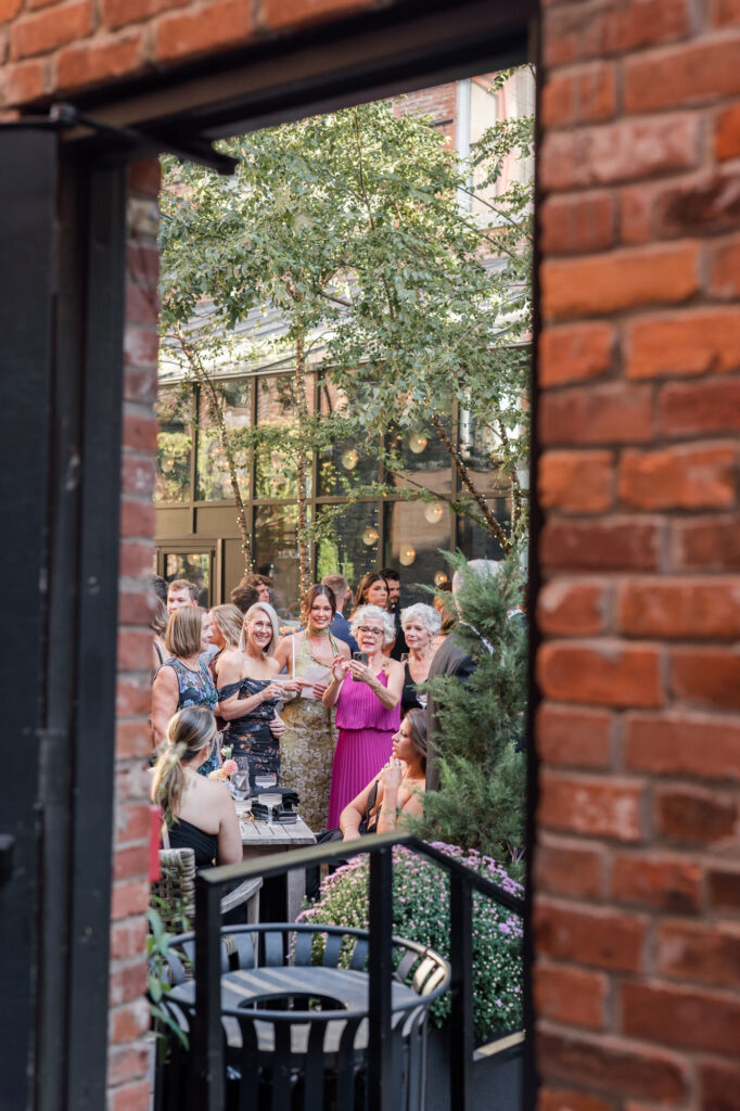 Guests at hotel covington wedding in Kentucky, by Courtney Rudicel