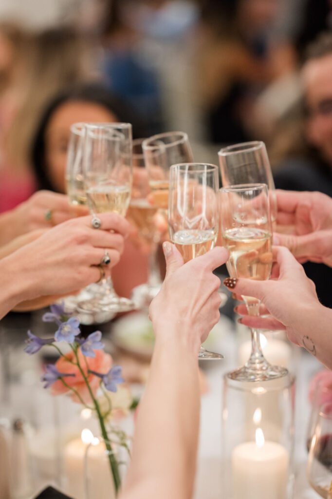Toasts and cheers at hotel covington wedding venue​ in Kentucky 
