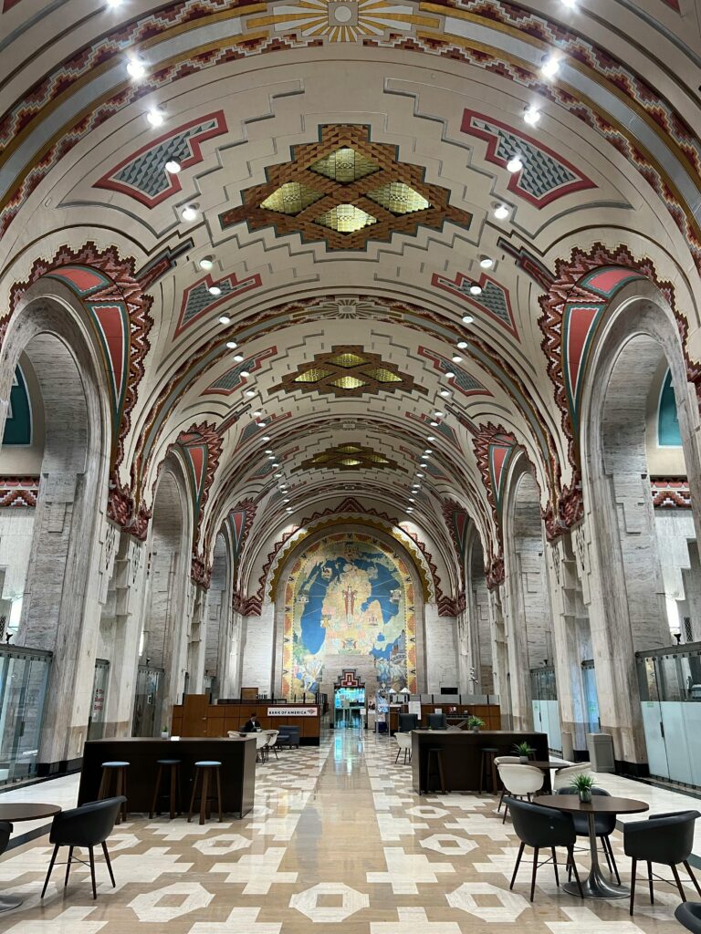 Detroit engagement photo locations at the Guardian Building with colorful tile interior. 