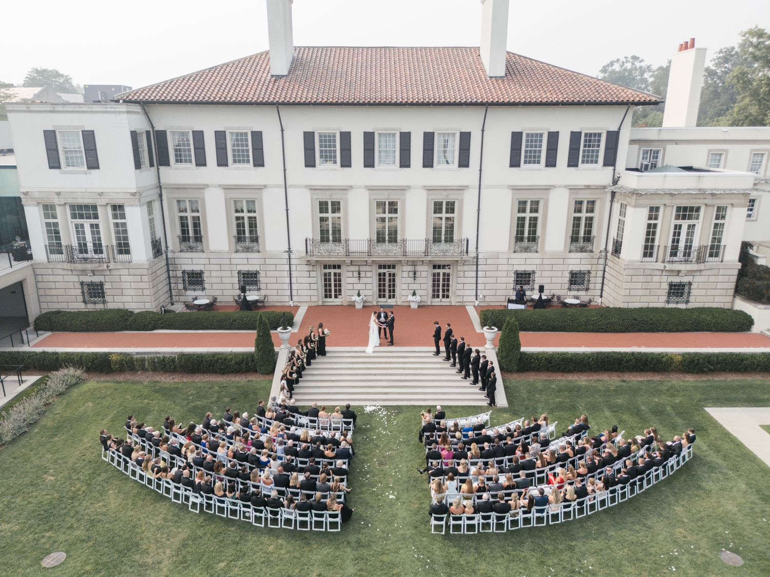 Aerial photo of a ceremony on the lawn at a Detroit Wedding at The War Memorial 