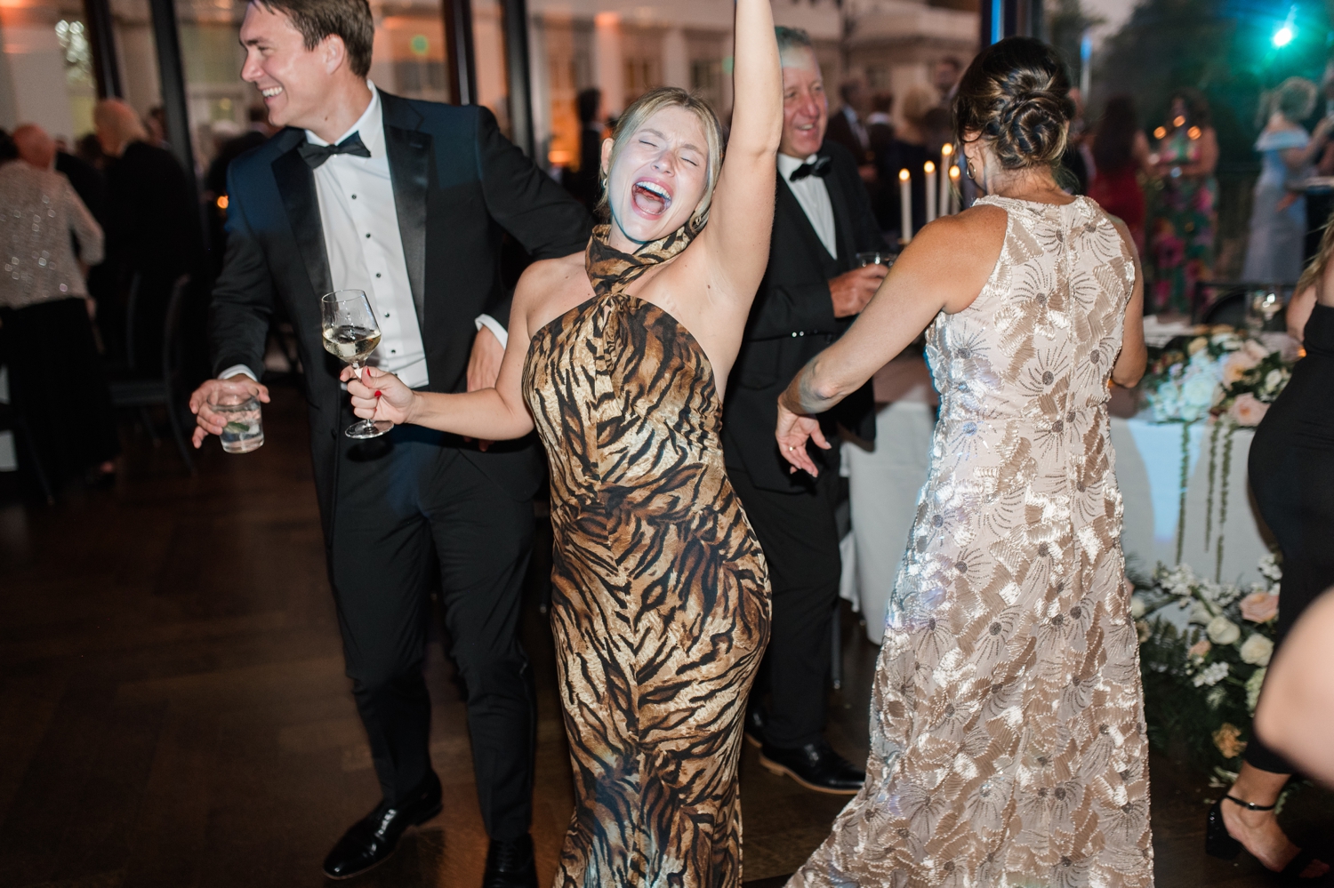 Wedding Guests dancing on a dance floor at a Detroit Wedding at The War Memorial 