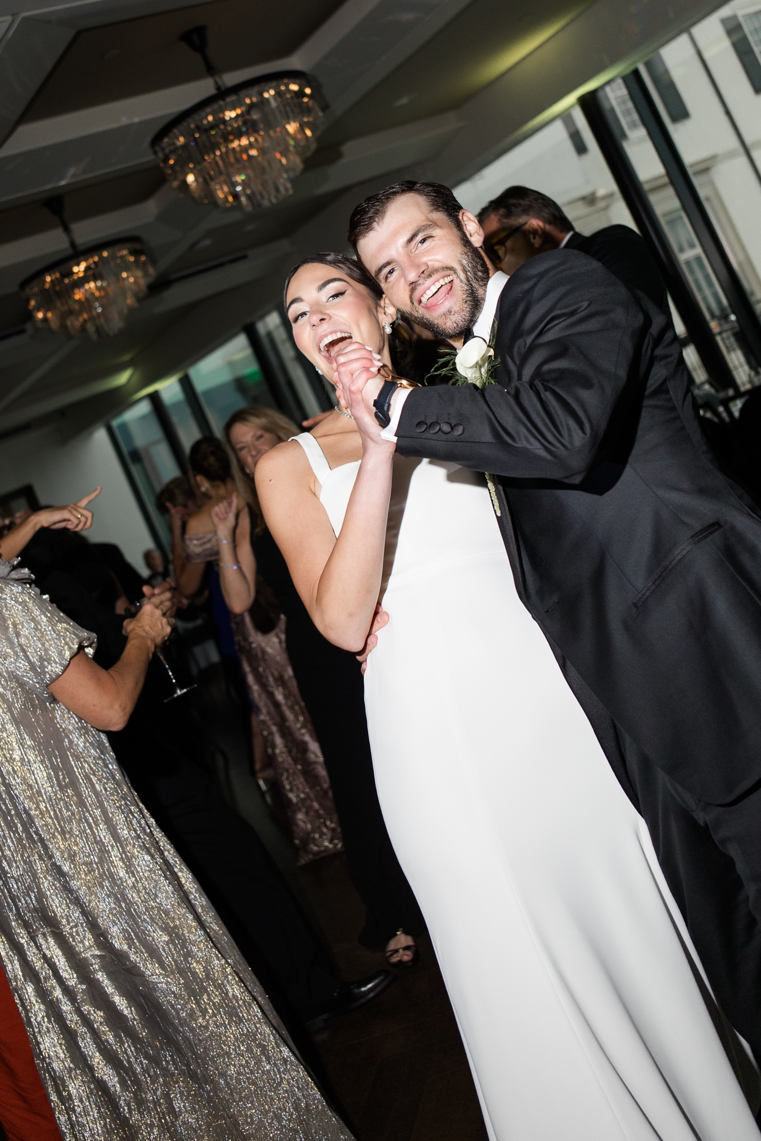 Bride and groom on dance floor on the wedding day at a Detroit Wedding at The War Memorial 