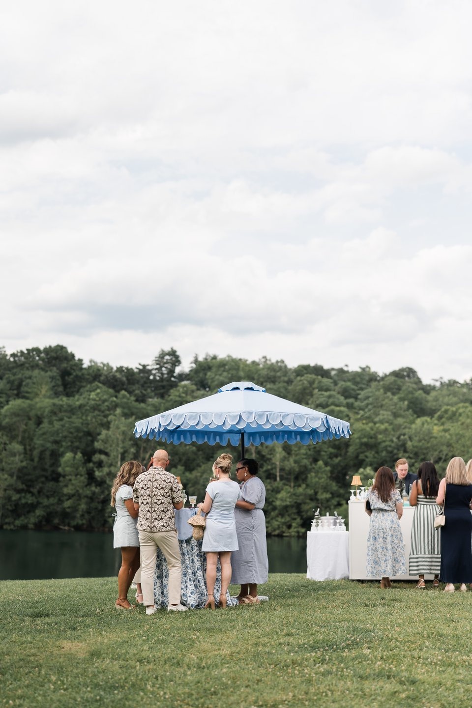 photograph of guests gathered on the expansive lawns at one of the best outdoor wedding locations in cincinnati