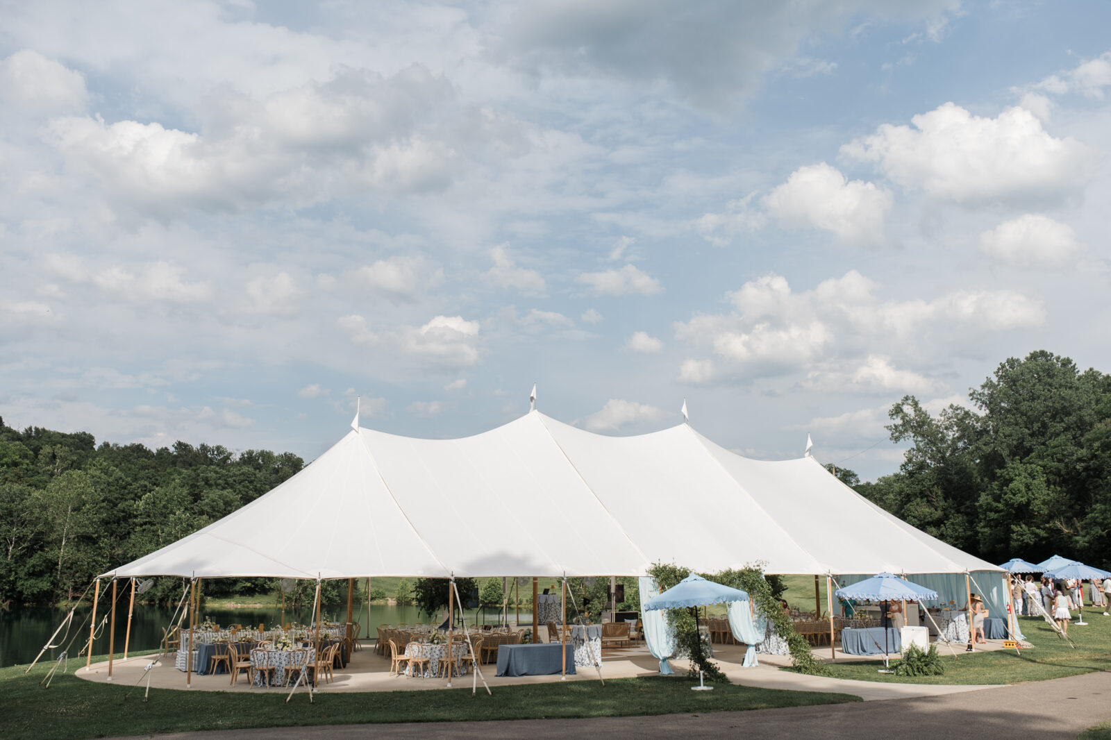 wideshot photo of a tented outdoor wedding in cincinnati