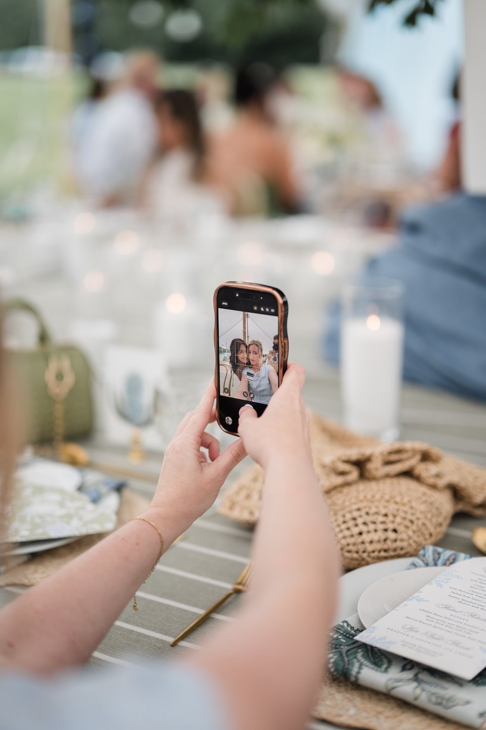 photograph of guests taking a selfie at one of the best outdoor wedding locations in cincinnati