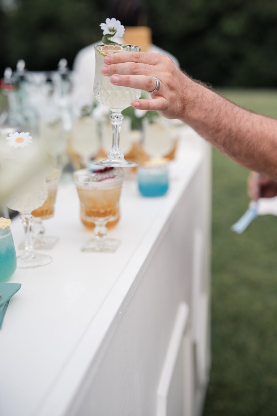 photograph of drinks being served at an outdoor wedding space in cincinnati